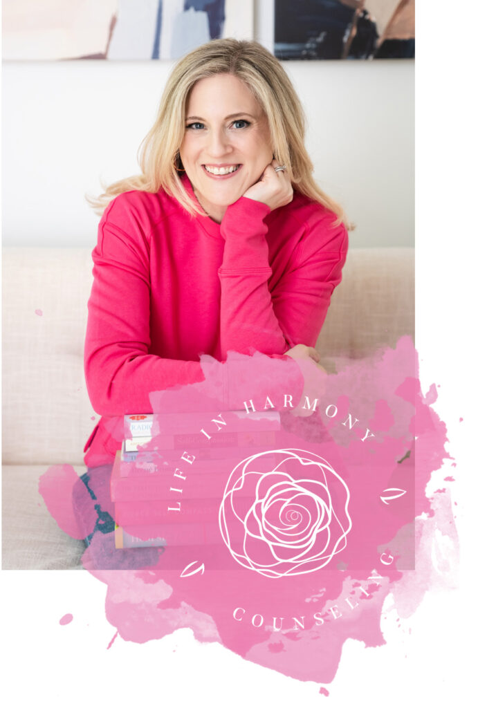 photo of Denise Kitanovski of Life in Harmony Counseling sitting on a sofa, leaning on some books and smiling. Graphic element overlaid.